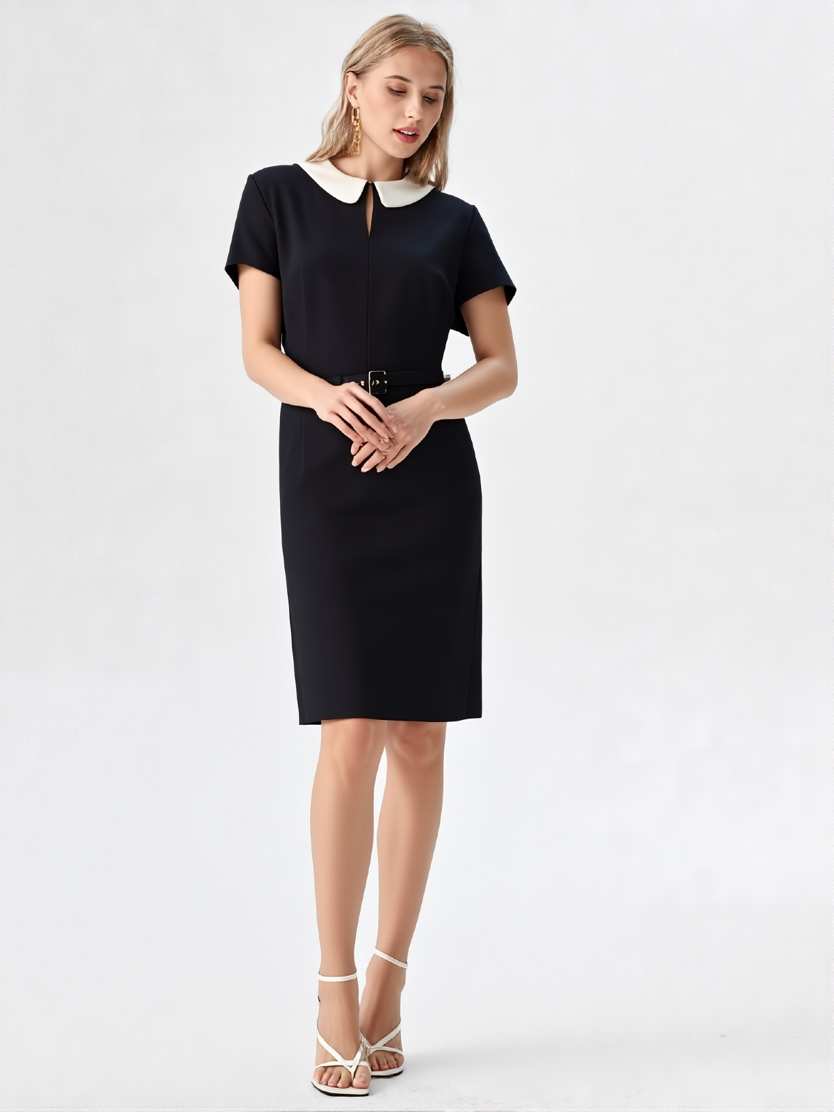 Elegancka stylizacja biznesowa z czarną sukienką ESCADA